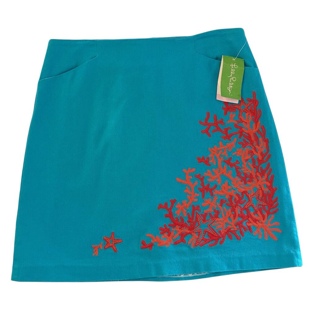 Lilly Pulitzer NWT | turquoise Roslyn skirt with orange coral detail | size 4